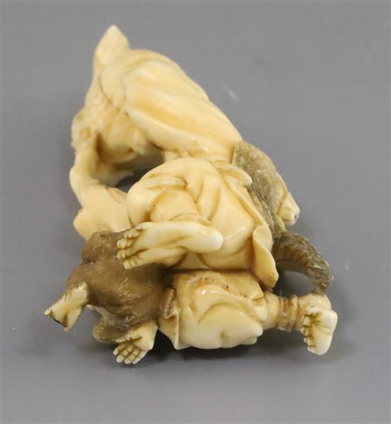 A Japanese ivory okimono of a Yamabushi Tengu, Meiji period, H. 11.8cm